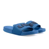 Ojotas Umbro de goma color gris claro, con logo de la marca en verde en la tira.