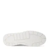 Championes urbanos color beige con detalles en blanco y negro, suela gruesa y cordones negros.