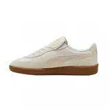 Championes Puma Palermo Premium, color negro con detalles en blanco y suela marrón.