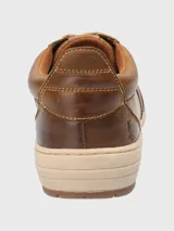 Championes urbanos Hush Puppies modelo Draper, color azul marino, confeccionados en cuero, con cordones grises, plantilla Smart Foam® y suela de goma color beige.