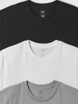 Pack de tres camisetas Gap de algodón, con cuello redondo y manga corta. Incluye una camiseta negra, una blanca y una gris.