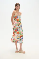 Vestido largo sin mangas de viscosa, con estampado de frutas y palmeras.