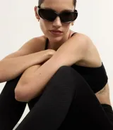 Calza deportiva larga color rosa viejo, de poliamida texturizada y sin costuras, con cintura alta.