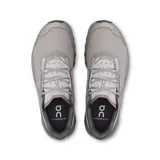 Championes de running On Cloudmonster Void, color gris con detalles en celeste y blanco. Presentan suela con tecnología CloudTec y diseño con perforaciones hexagonales.