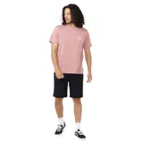 Remera rosa de manga corta con logo de Rip Curl estampado en el pecho.