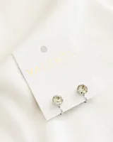 Par de caravanas plateadas con clip y cristal facetado.