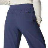 Pantalón jogger color marrón, con cintura elástica, bolsillos laterales y puños elásticos.