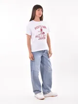 Remera blanca de algodón con estampado de limones y texto en azul.
