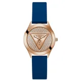 Reloj Guess Iconic con caja redonda de acero tono oro rosa de 34 mm y esfera a juego con detalles brillantes. Correa de silicona azul y logotipo triangular “G” en el centro.