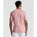 Remera de jersey color rosa con estampado del logo de la marca combinado con motivo floral.