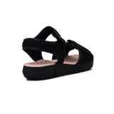Sandalias negras con plataforma baja y ajuste de velcro en el tobillo y en la parte delantera.