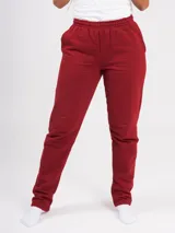 Pantalón deportivo color burdeos de felpa, con cordones ajustables y corte recto de tiro alto.