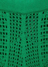 Pantalón largo de punto calado color verde, con diseño wideleg y cintura elástica.