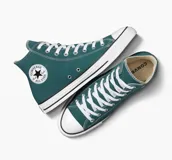 Championes Converse Chuck Taylor All Star de caña alta, color verde azulado, con cordones blancos y suela de goma blanca con línea negra.