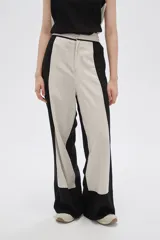 Pantalón ancho de viscosa con diseño color block y punto smock.