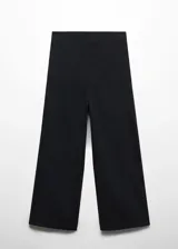 Pantalón crop color beige, de lino y viscosa, con corte wide leg y cintura elástica.