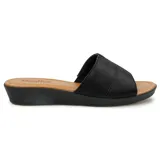 Sandalias Usaflex negras con capellada de cuero y suela comfy.