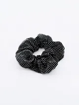 Colero negro con pequeños apliques plateados.