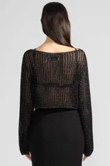 Sweater corto de tejido de punto calado color negro con detalles brillantes.