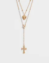 Collar corto doble dorado, con cadena de esferas, dije de corazón y dije de cruz con strass.