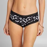 Pack de tres culottes de microfibra con cintura de encaje. Uno color ladrillo liso, uno negro con lunares blancos y uno negro con estampado abstracto blanco.