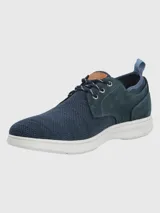 Zapatilla urbana Hush Puppies modelo Port, color tostado, con capellada de cuero y malla, cordones y suela con tecnología ZeroG de EVA.