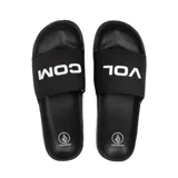 Sandalias tipo ojotas negras con el logo de Volcom en blanco en la tira superior.