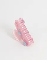 Broche para el pelo celeste con apliques de strass y flores de acrílico rosas y celestes.