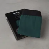 Boxer color beige con pretina elástica negra con logo VCP en blanco.