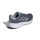 Championes Adidas Response grises con detalles plateados y suela blanca con detalles en verde.