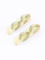 Set de dos broches para el pelo con forma de cadena color crema y detalles dorados.