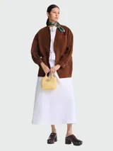 Bolso Longchamp modelo Le Roseau XS, color amarillo.