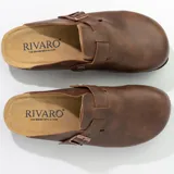 Zuecos marrones de cuero con plantilla de corcho, suela de goma negra y hebilla ajustable.