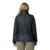 Chaleco acolchado Columbia Heavenly II para mujer, color negro, con forro termorreflectante Omni-Heat™, cuello de felpa forrado de vellón, cierre frontal de dos vías, bolsillos laterales con cremallera y bolsillo interior de seguridad.