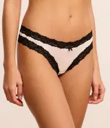 Kit de dos bombachas bikini de microfibra, una negra y otra blanca, con encaje en las sisas y moño decorativo.