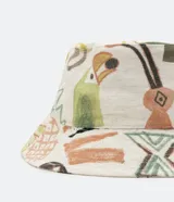 Sombrero tipo bucket de algodón con estampado de figuras abstractas y animales en tonos pastel.