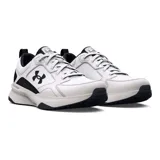 Championes Under Armour Charged Edge para hombre, color negro con detalles en verde flúor y suela blanca. Ideales para entrenamiento en gimnasio o al aire libre.