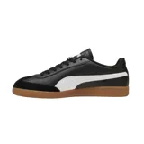 Championes Puma 9T blancos con detalles en verde y beige, suela color caramelo.