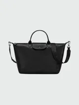 Bolso tote Longchamp Le Pliage Xtra de cuero color negro, con doble asa corta y correa larga extraíble.