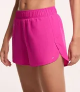 Short deportivo verde oscuro, modelo runner, con cintura elástica y pequeño bolsillo interior.