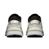 Championes urbanos color celeste con detalles en negro y blanco, con suela gruesa y logo de la marca en el lateral.