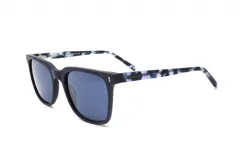 Lentes de sol Prototype con montura cuadrada azul y patillas estampadas en blanco y negro.