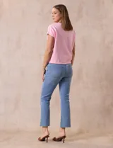Buzo tejido color lila, marca Ninety. Escote en V. Calado en escote y delantera.