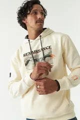 Canguro color crema con capucha y cordones negros, estampado frontal con la imagen de la creación de Adán y la palabra "Renaissance". Tiene bolsillos laterales y logo en grifa de goma.