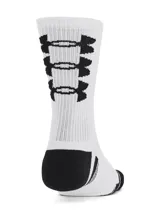 Pack de tres pares de calcetines deportivos Under Armour Tech, blancos con detalles en negro. Uno de los pares es liso con el logo de la marca, otro tiene dos rayas horizontales en la parte superior y el tercero tiene detalles geométricos en el tobillo.