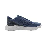 Zapatillas deportivas azules de hombre con capellada de malla y detalles en material sintético. Suela blanca con diseño texturizado.