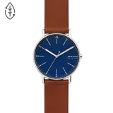 Reloj Skagen Signatur con caja plateada de acero inoxidable de 40mm y correa de cuero marrón. Esfera azul con agujas plateadas y cristal mineral.
