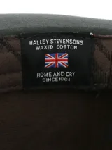 Sombrero RKF Sheffield de canvas engrasado color verde oscuro con cinta trenzada y ojales metálicos.