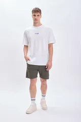 Bermuda deportiva verde de piqué.