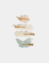 Set de cuatro hebillas para el pelo con forma de flor y mariposa, en tonos pastel y dorado.